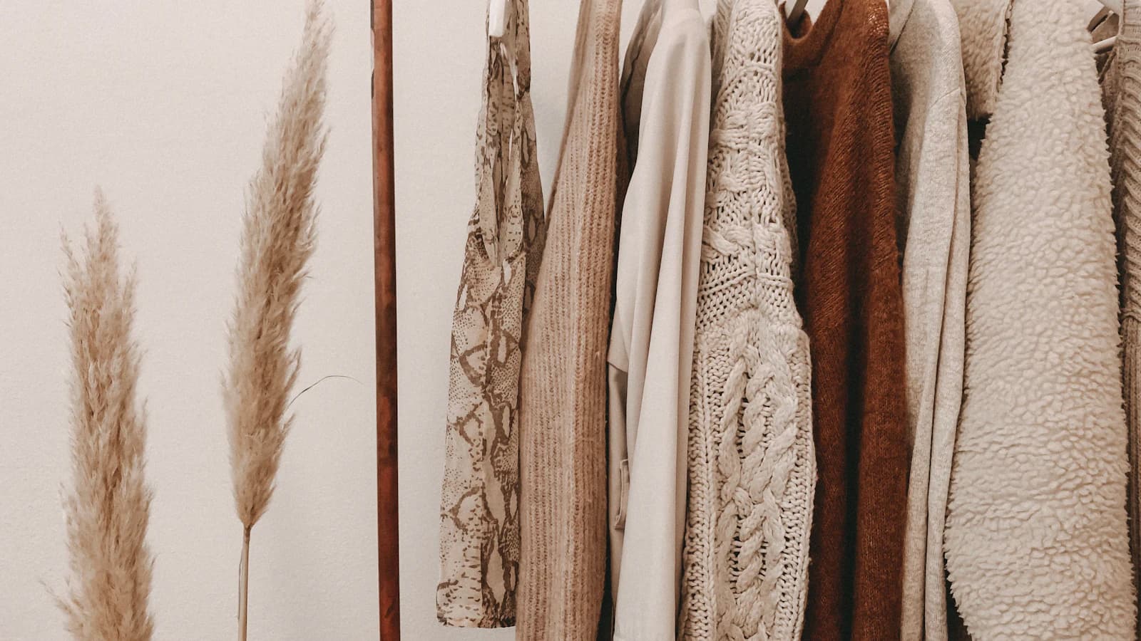 Neutral cotton garments on a rail